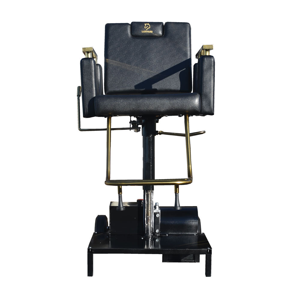 Electric Barber chair with blue leather seat and gold accents on a white background