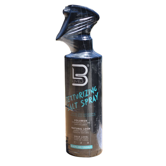 Texturizing salt spray bottle with brand logo on a white background